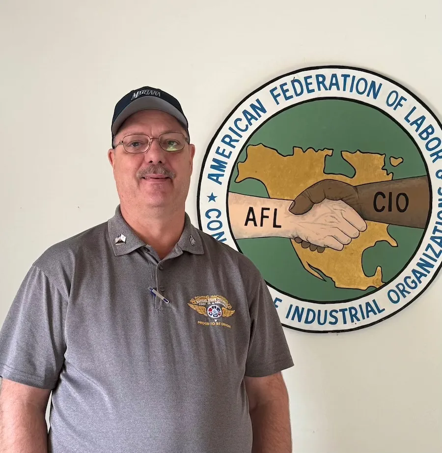 President Brian Alexander before the AFL-CIO logo